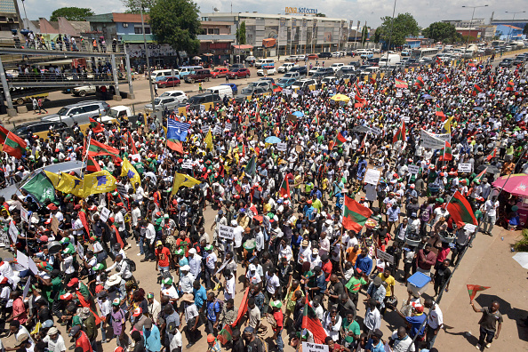 Supporters of UNITA and other opposition groups protest against Angola's ruling party