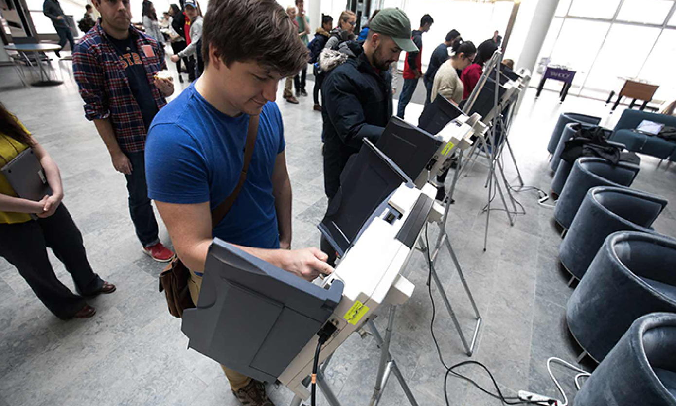 Voter in digital voting booth