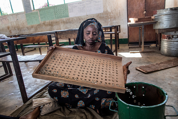 Gambia election: Voters use marbles to choose president